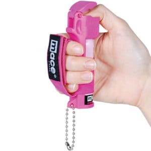 Mace hot pink sport model in womans hand