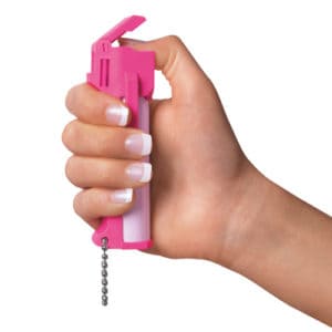 pepper spray in womans hand