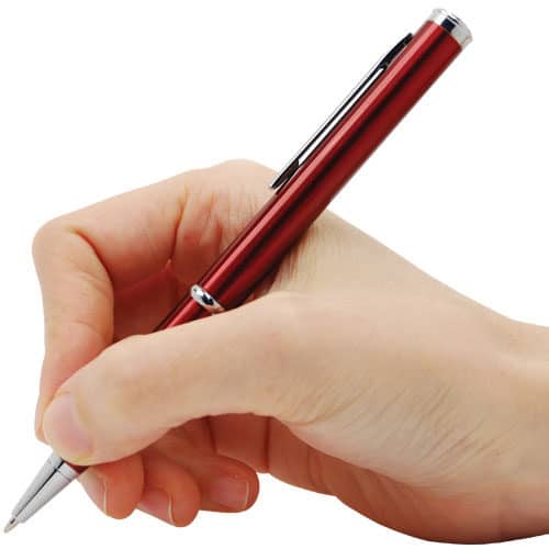 Red pen knife in hand writing
