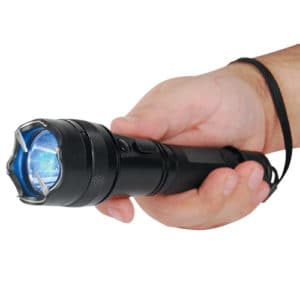 Shorty stun flashlight with lanyard around wrist