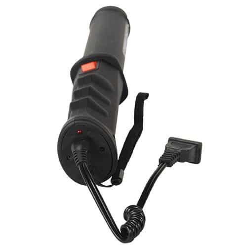 Stun Baton with charging cord plugged in