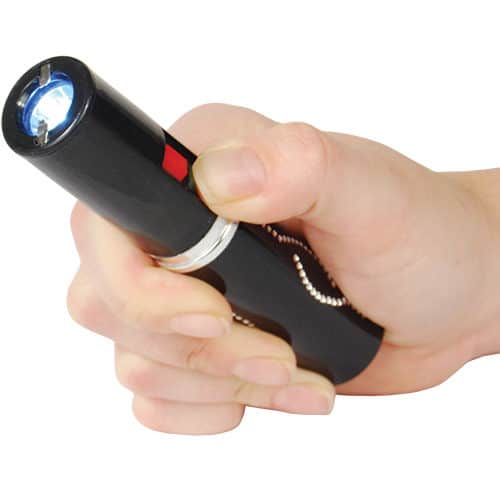 black lipstick stun gun in womans hand