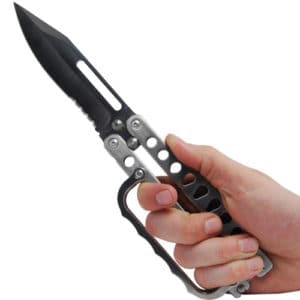 Stainless Steel Butterfly trench knife open in a hand