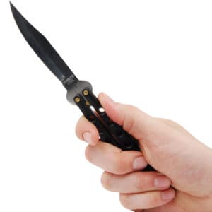Black bally song knife in hand