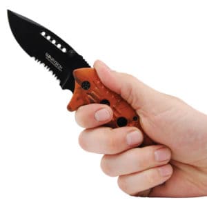 Rescue knife being held