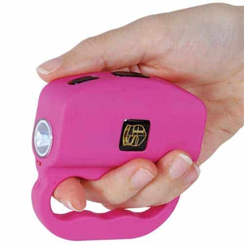 Pink Talon stun gun being held