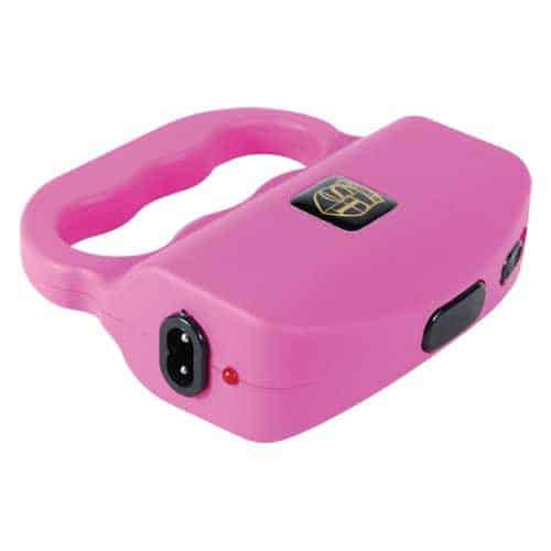 Pink Talon stun gun laying on side