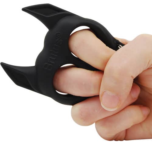 Black Brutus self defense key ring in womans hand